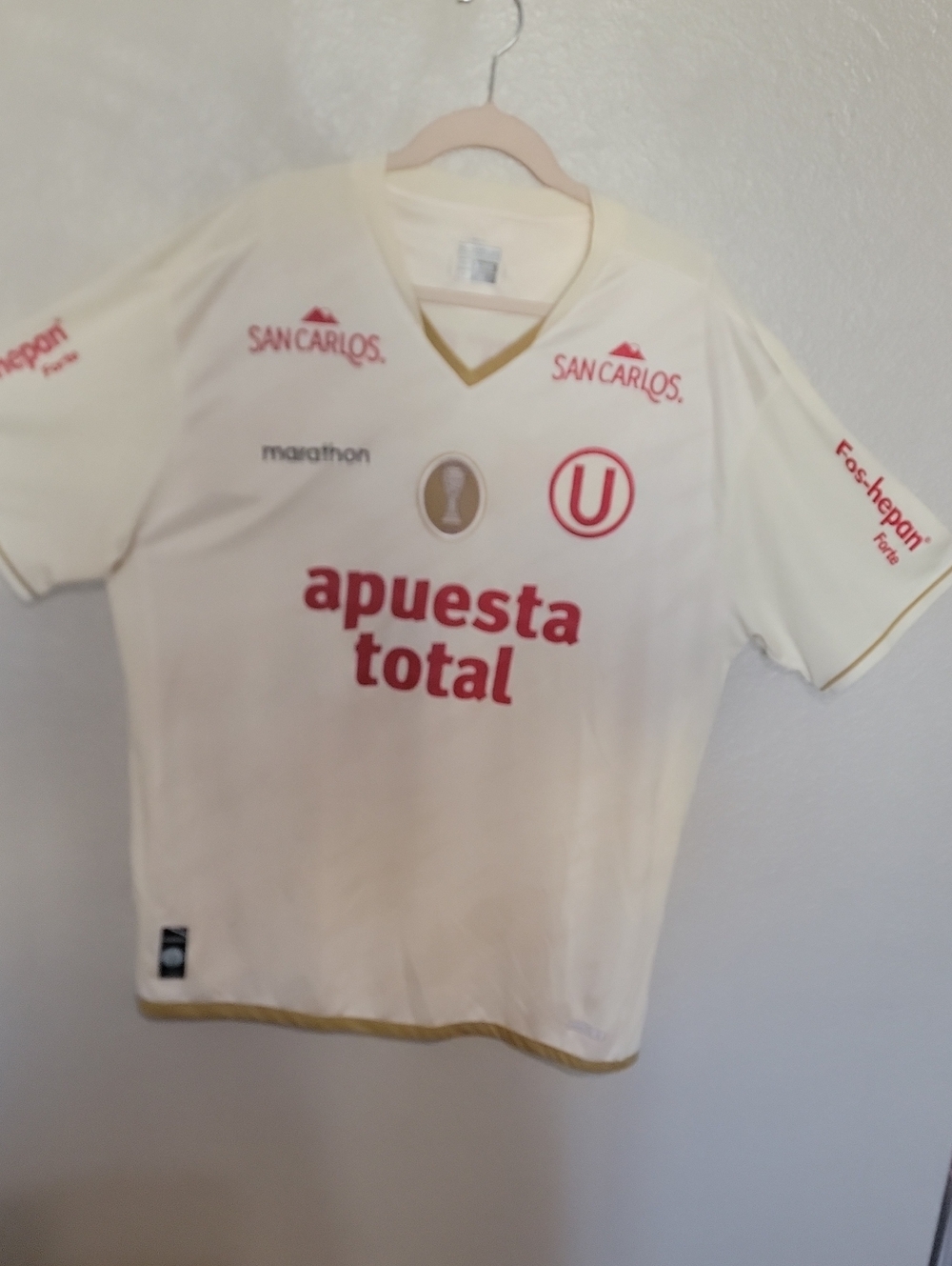 Cream Soccer Jersey with Red Logos